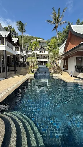 Pool-access room with lounger and coconut